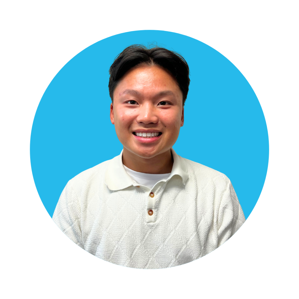 Mr. Chris, Behavior Technician at Therapy Smarts, smiling in a white sweater against a blue background, representing the ABA team dedicated to pediatric behavioral therapy services.