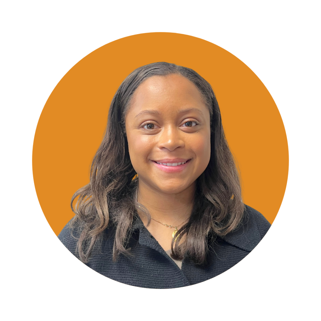 Ms. Gillian, Registered Behavior Technician at Therapy Smarts, smiling against an orange background.